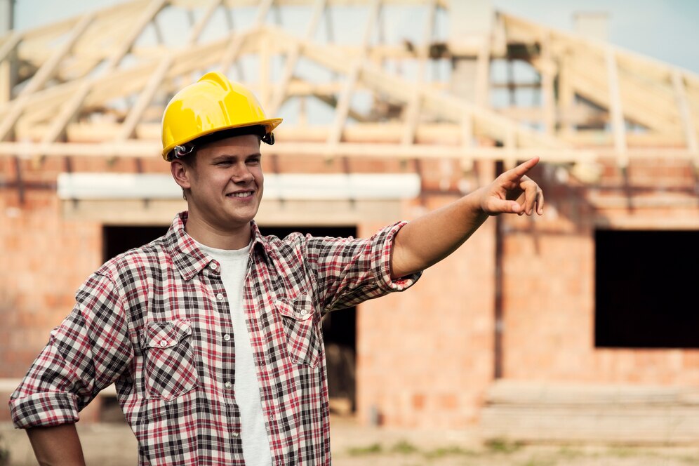 construction-worker-pointing-something_329181-2832