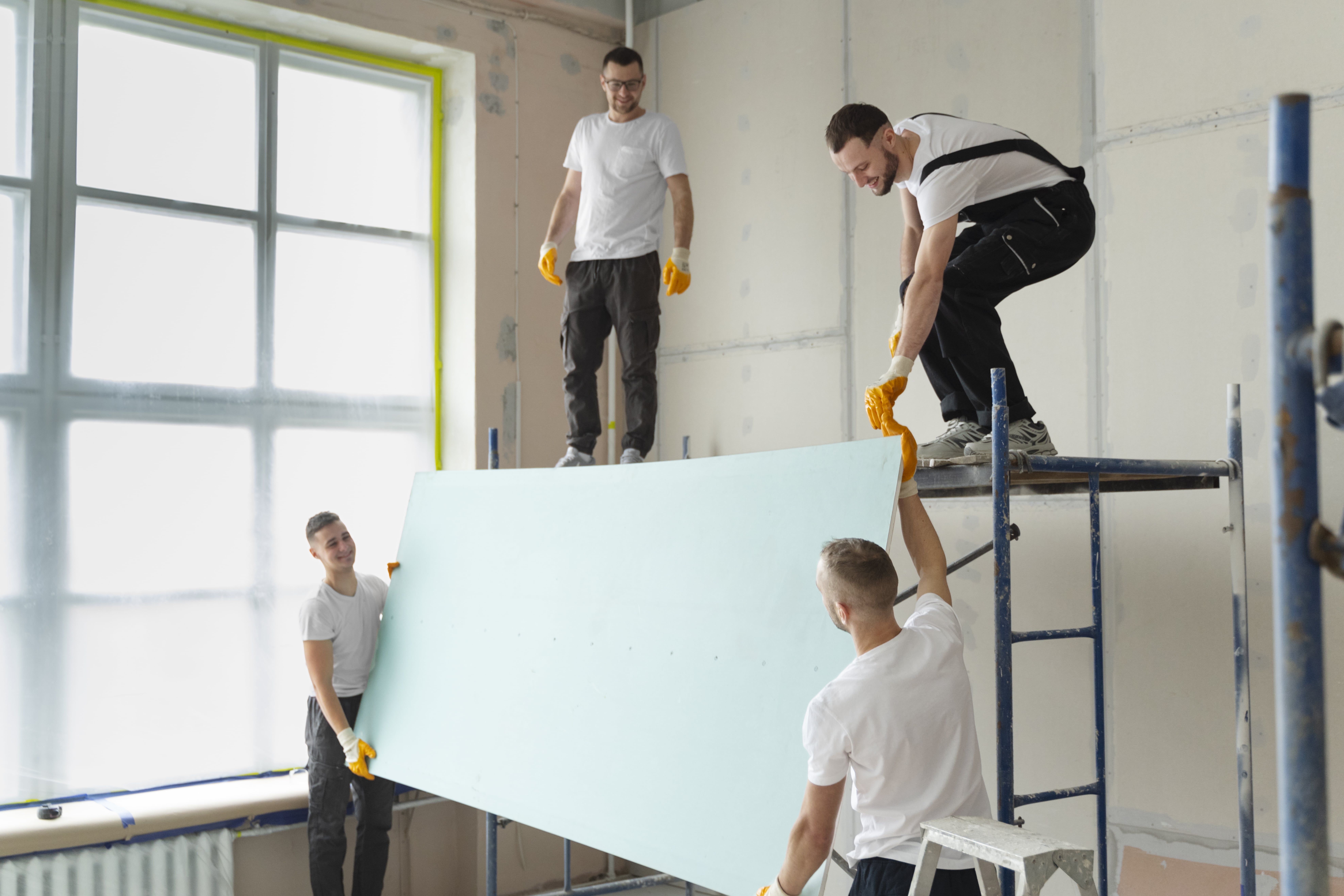 medium-shot-people-carrying-placard-together-min